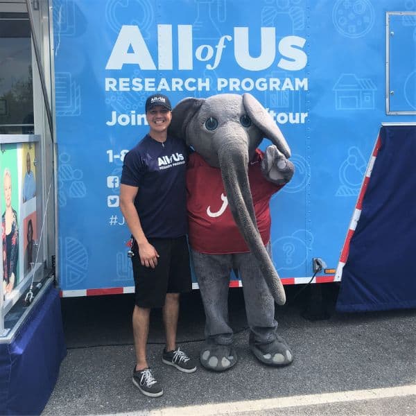 Field team leader, Francisco, posing with University of Alabama elephant mascot.