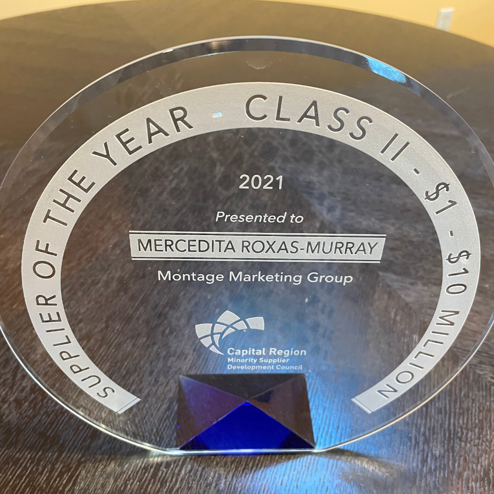 CRMSDC Class II Supplier of the Year Award - a glass circle inscribed with the award name and the winner, "Mercedita Roxas-Murray, Montage Marketing Group"