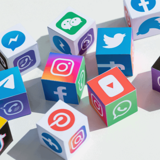 Social media icons displayed on four-sided blocks