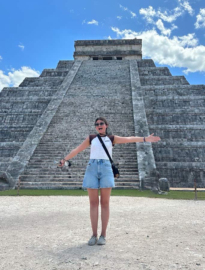 Jenn standing in front of a pyramid